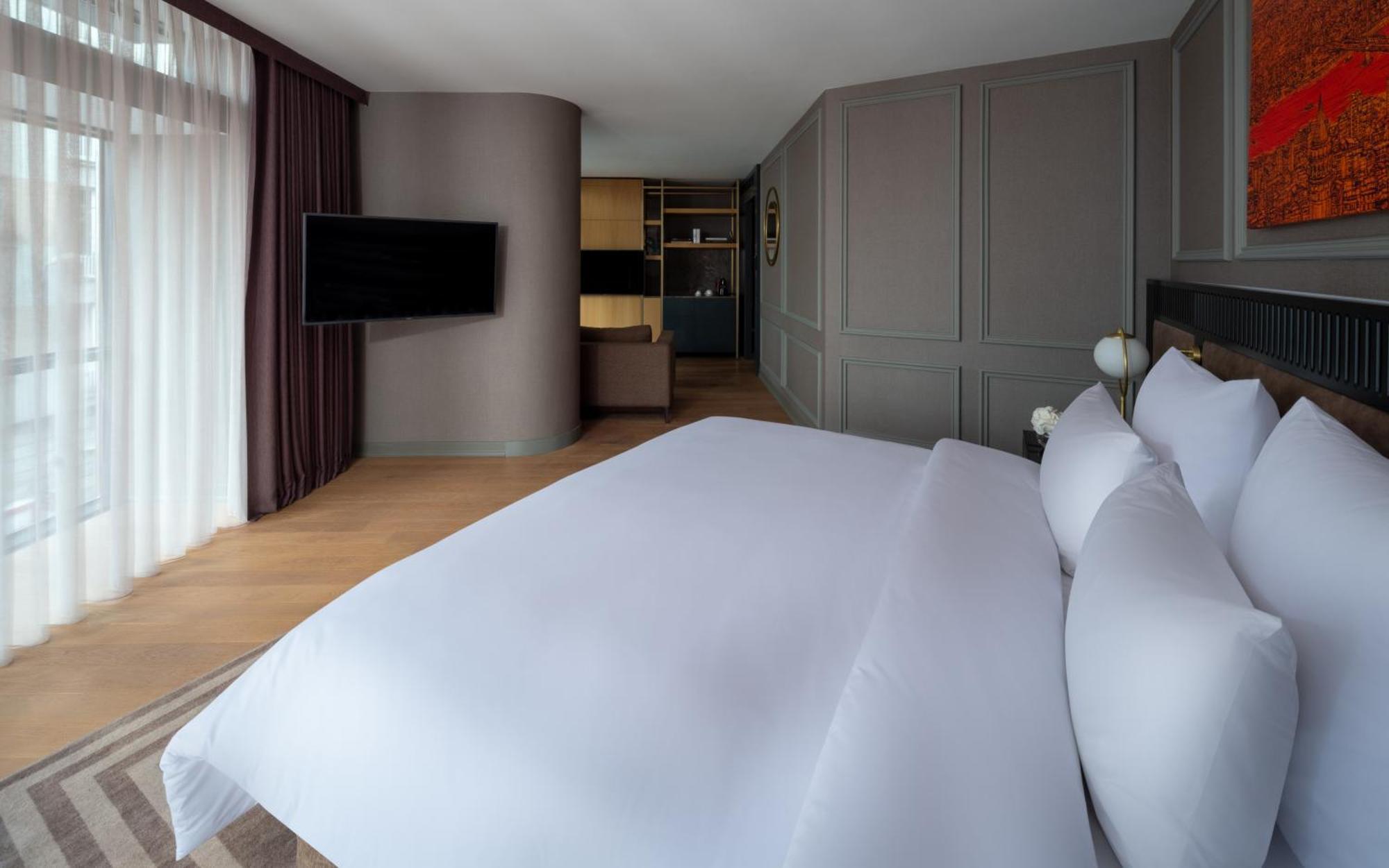 Hotel Sofitel Istanbul Taksim Exterior foto A bedroom at the hotel