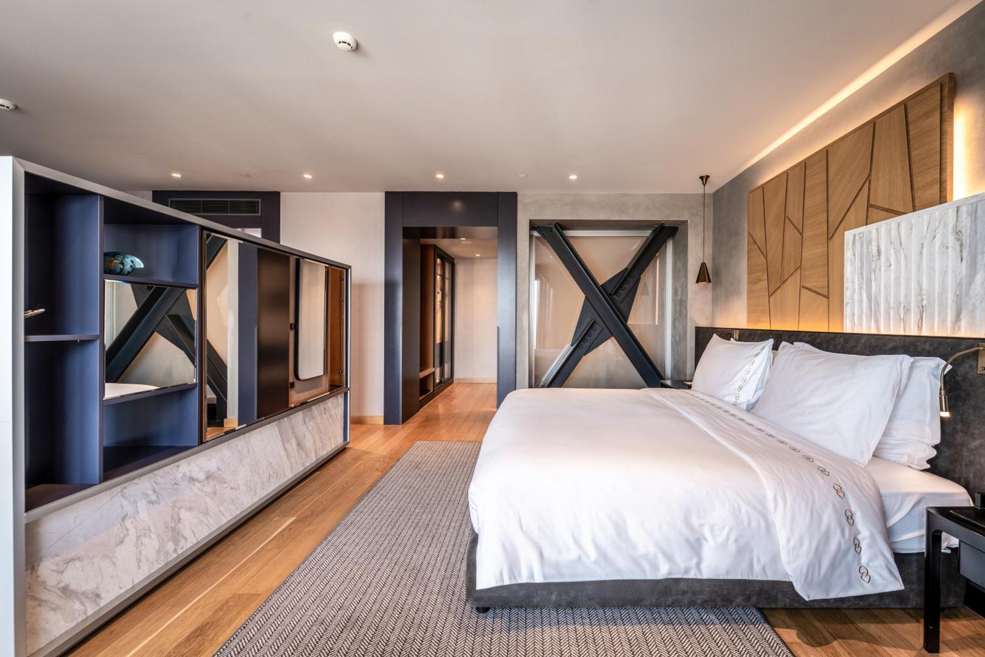 Hotel Sofitel Istanbul Taksim Exterior foto A bedroom at the hotel