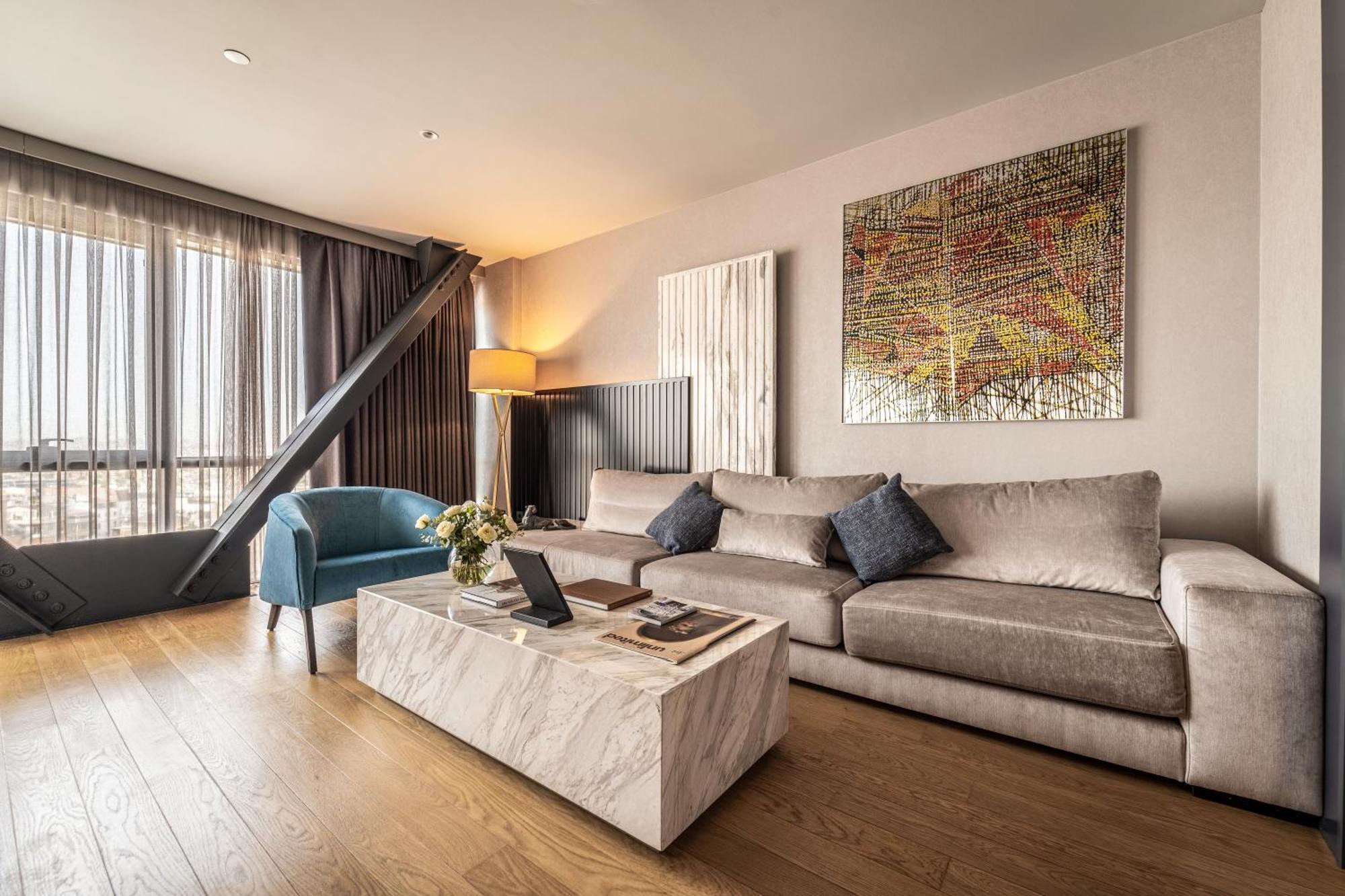 Hotel Sofitel Istanbul Taksim Exterior foto A living room in a penthouse apartment
