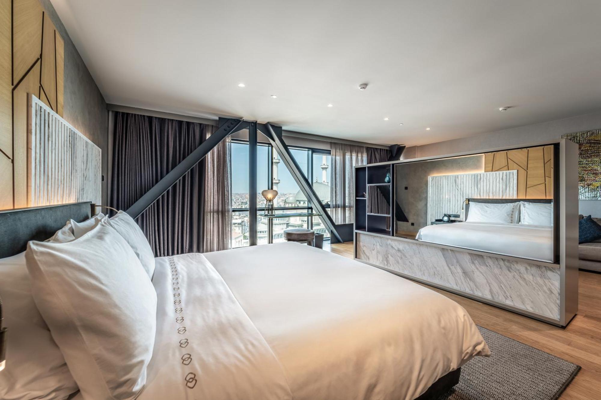 Hotel Sofitel Istanbul Taksim Exterior foto A bedroom at the hotel